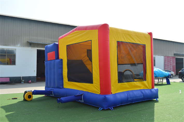 Red, yellow and blue bounce house FWC297